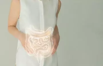 Woman with highlighed intestines, showing digestive health