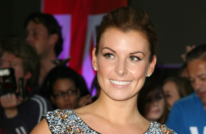 Coleen Rooney with tattooed eyebrows