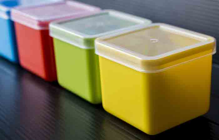 Four differently colored plastic boxes