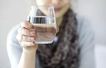 Drink adequate water for getting a smaller waist in a week