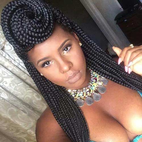 Twirled half up bun braided updo for black women