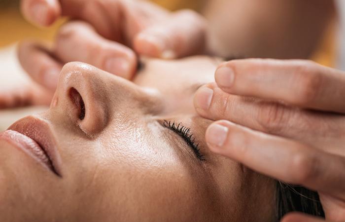 Acupressure massaging around the eyes