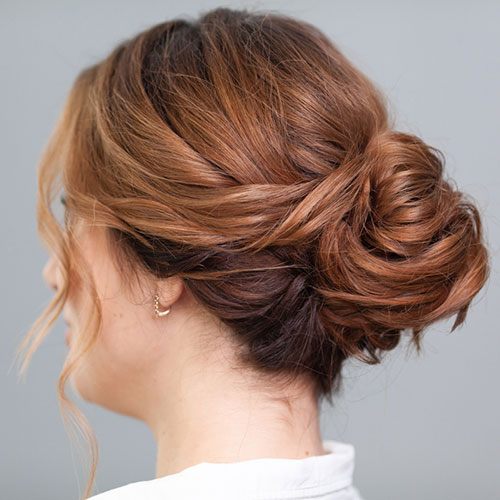 Faux chignon updo for curly hair