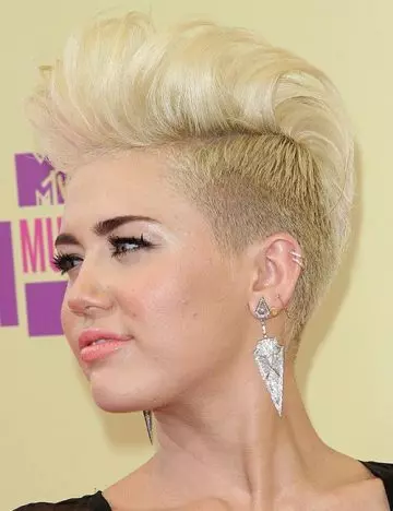 Short high rise mohawk blonde hairstyle