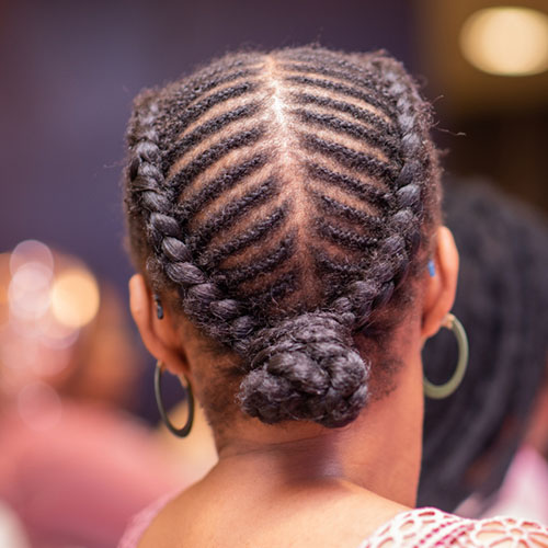 Low halo braided updo for black women