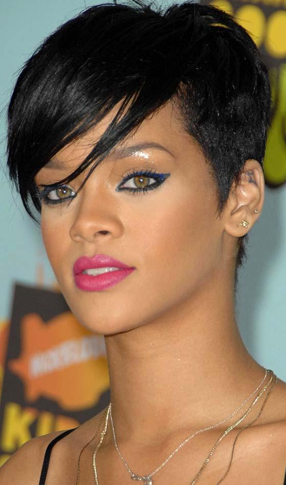 Punk pixie cut with extended side bangs short choppy hairstyle