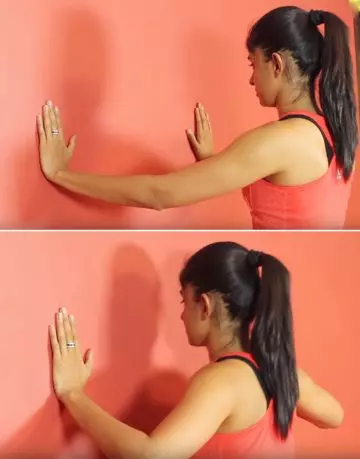 Wall push-ups for natural breast lift