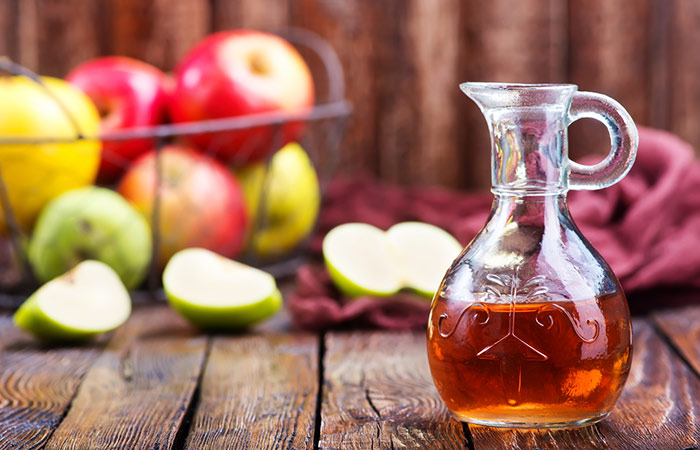 Apple cider vinegar in a glass bottle