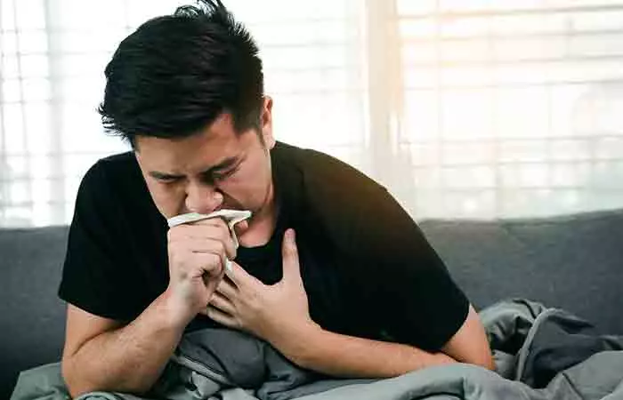 Man suffering with bronchitis