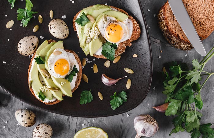 A spread of avocado and quail egg toast as part of a detox diet