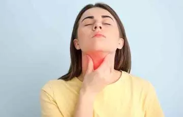Woman checking thyroid gland 