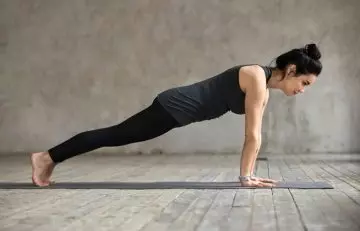 Woman practicing the Plank Pose