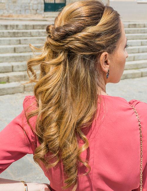 Braid and pouf half up-half down prom hairstyle