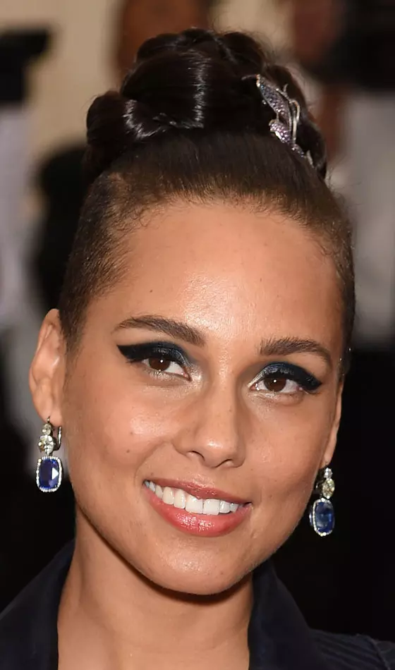 Braided bun Indian hairstyle for round face