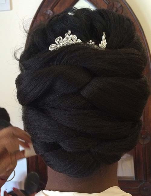 Criss-cross bun wedding hairstyle for black women