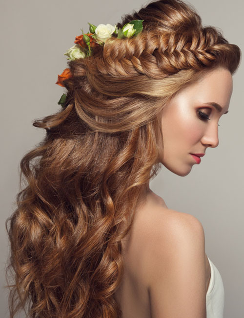 Double braided crown half up-half down prom hairstyle