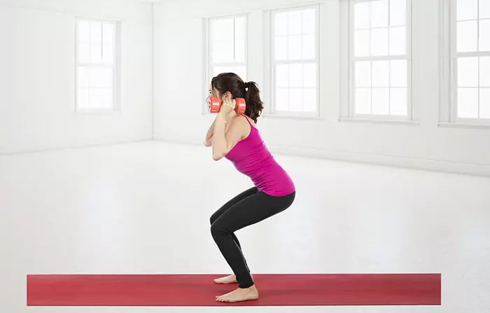 Dumbbell squats exercise for legs and thighs