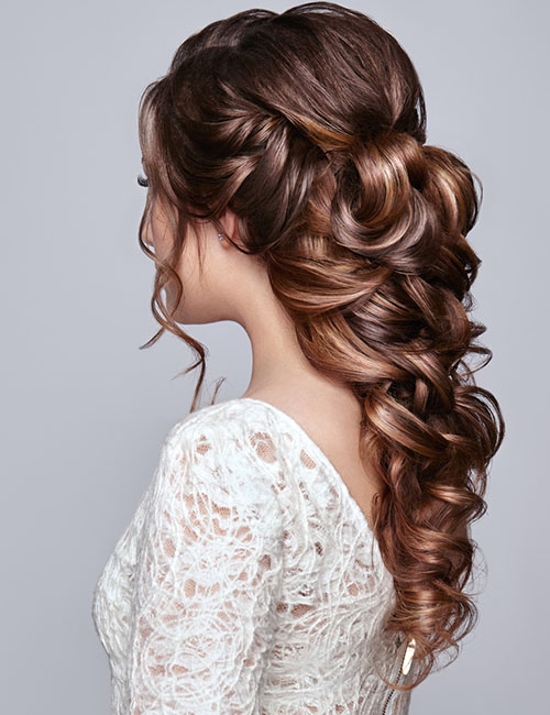 Folded half up-half down prom hairstyle