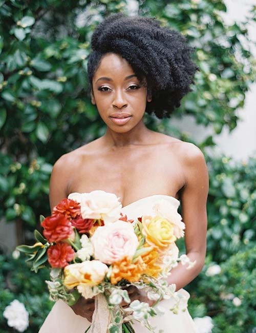 Side swept afro wedding hairstyle for black women