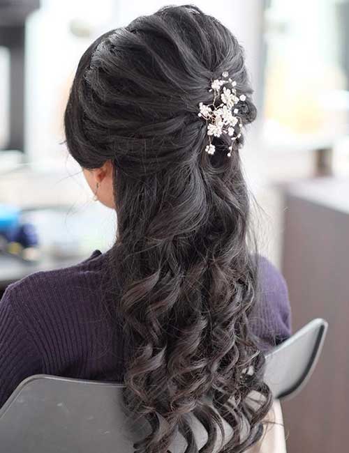 High bouffant half up-half down prom hairstyle