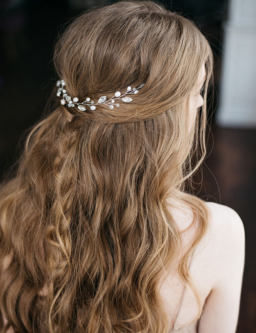 Tuck-in half up-half down prom hairstyle