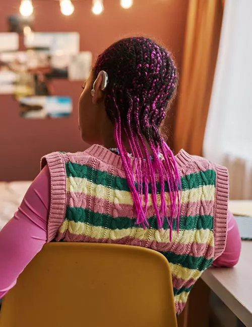 Baby pink accented cornrows braids hairstyle