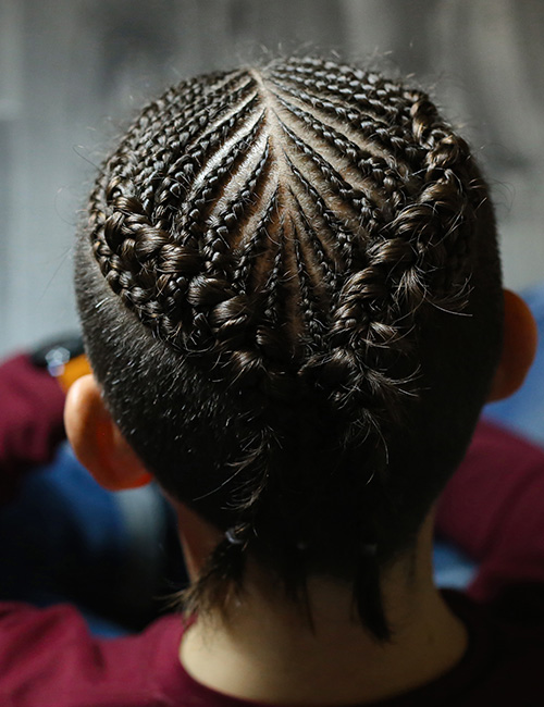 Combined cornrows Dutch braids hairstyle