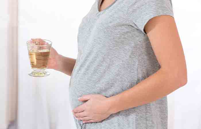 Pregnant woman having Earl grey tea
