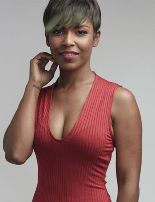 Pixie bob haircut with olive green highlights for black women