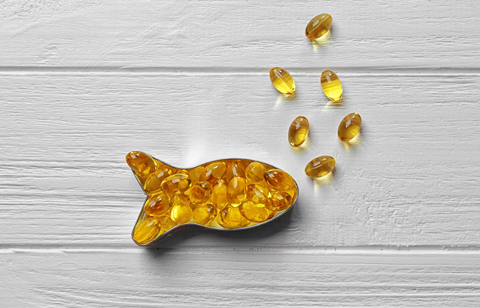 Fish oil supplements kept in a fish-shaped bowl