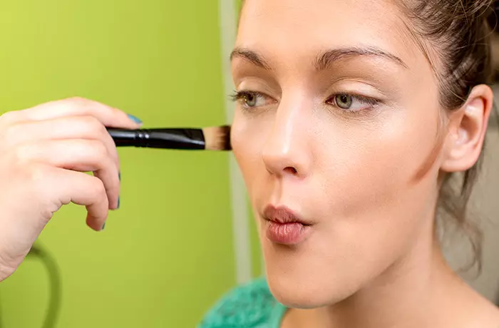 Step 3 of how to contour a heart-shaped face