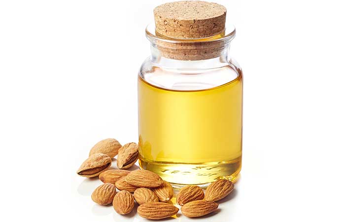Lemon juice and almond oil for hair treatment