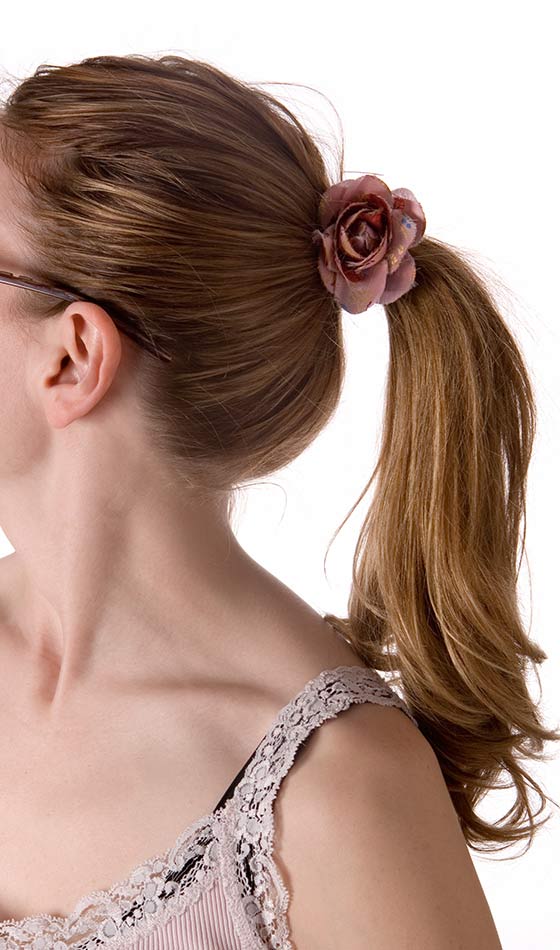 Accessorize your ponytail with hair bands or hair pins
