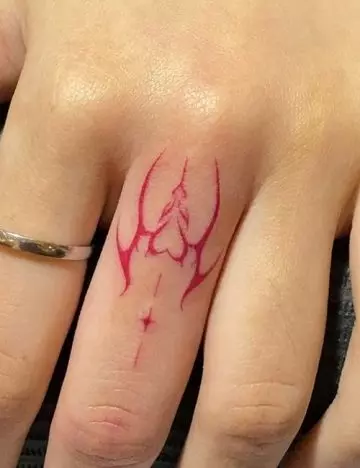 Flame finger tattoo