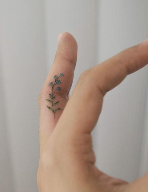 Flower Finger Tattoo