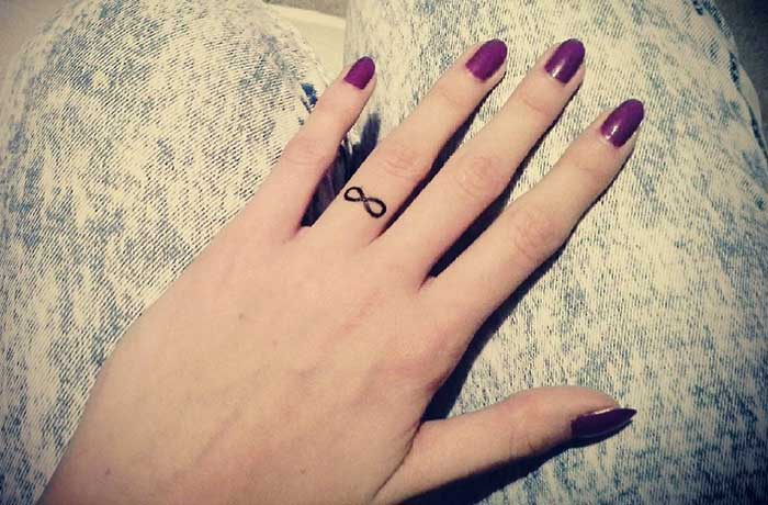 Infinity tiny finger tattoo