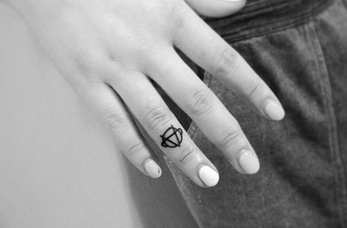 Sobriety symbol tiny finger tattoo