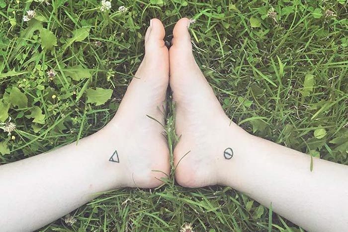 Glyph tiny tattoos symbolising exploration and harmony