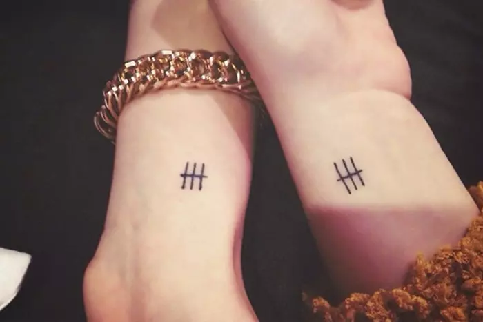 Friendship glyph symbol tiny tattoo