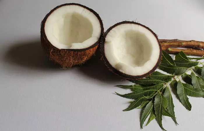 Coconut and neem leaves for dandruff remedy