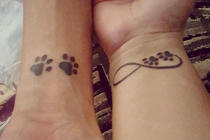 Tiny paws and infinity paws tattoos