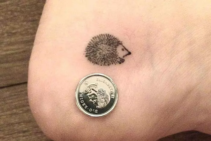 Tiny porcupine tattoo