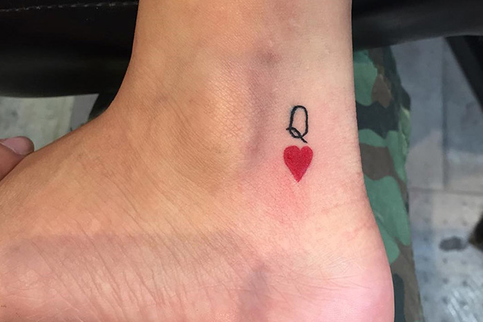 Tiny queen of hearts tattoo on ankle