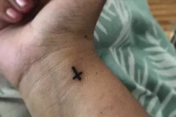 Tiny Cross tattoo