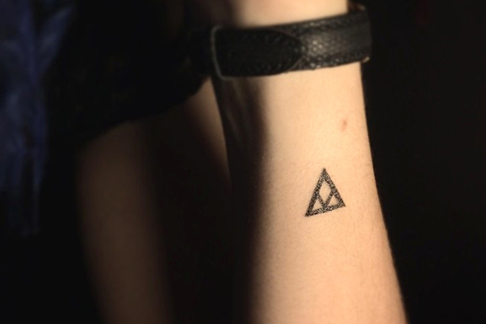 Transition symbol triangle tiny tattoo