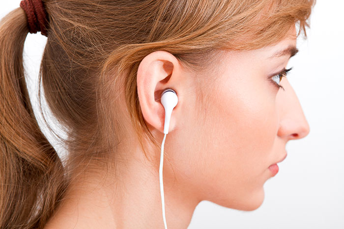 Irritation from the earphones material causes pimple in ear