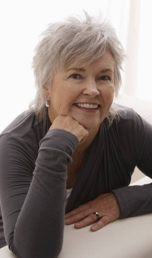 Gray tousled and cropped hairdo for women over 50