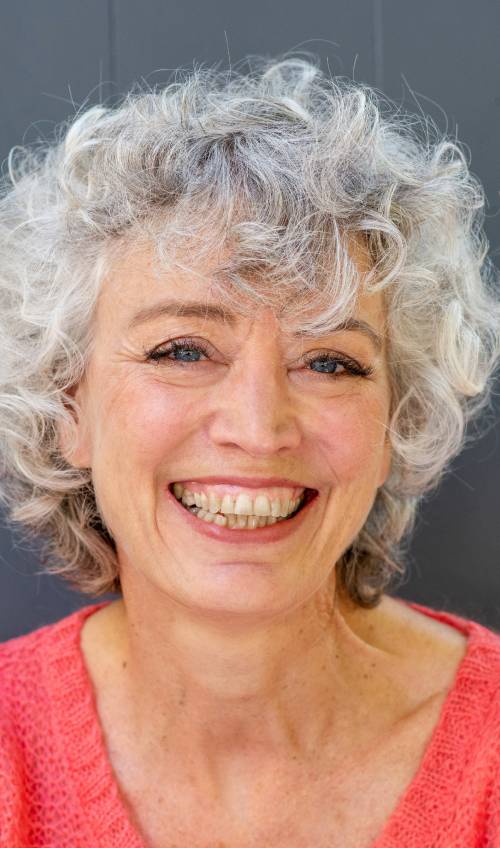 Pale blonde bob with wispy curls hairstyle for women over 50