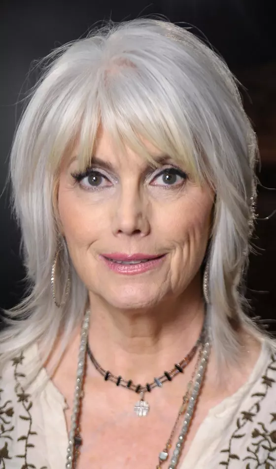 Platinum layers with bangs hairstyle for women over 50