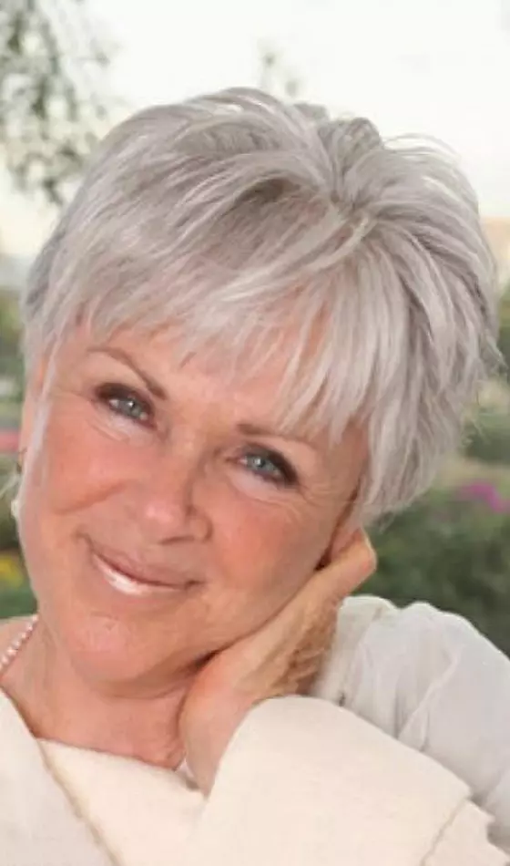 Platinum short crop with fringes hairstyle for women over 50